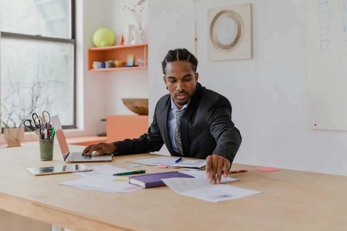 Supplier quotation analysis and pricing documents reviewed on screen